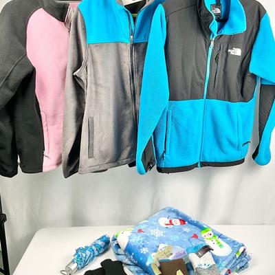 Lot M 372 Two North Face Fleece Jackets ( size XL ) / One Fila Fleece Jacket (size Lg) / Plush Throw / Mittens / Umbrella
