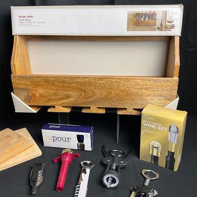Lot R 448. Wooden Wine Rack / NIB Two Sets of Four Wine Glasses / Cork Screws / NWT Cheese Board and more
