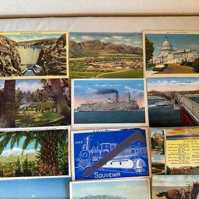 AN ASSORTMENT OF POSTCARDS