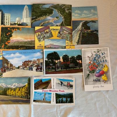 AN ASSORTMENT OF POSTCARDS
