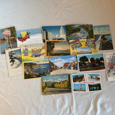 AN ASSORTMENT OF POSTCARDS