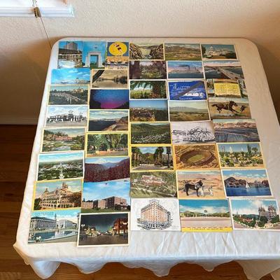 AN ASSORTMENT OF POSTCARDS