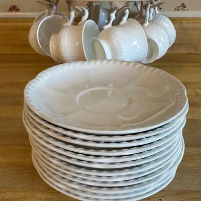 Two sets of Coffee Mugs and Plates