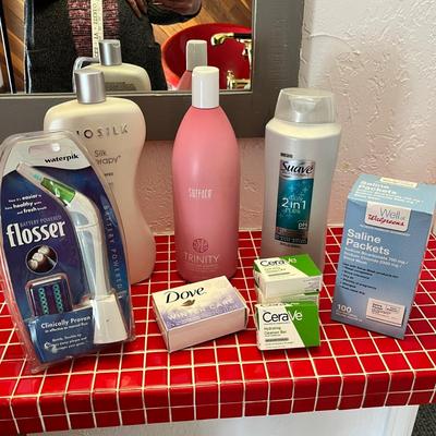 Lot 46 Misc personal care cerave soap bars, shampoos, saline packets, flosser (new in package)