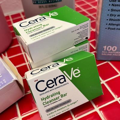 Lot 46 Misc personal care cerave soap bars, shampoos, saline packets, flosser (new in package)