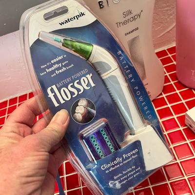 Lot 46 Misc personal care cerave soap bars, shampoos, saline packets, flosser (new in package)