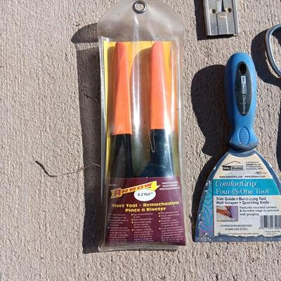 RIVET TOOL, SNIPS, LARGE FILE, NEEDLE NOSE PLIERS, PUTTY KNIFE AND BLADE SCRAPER