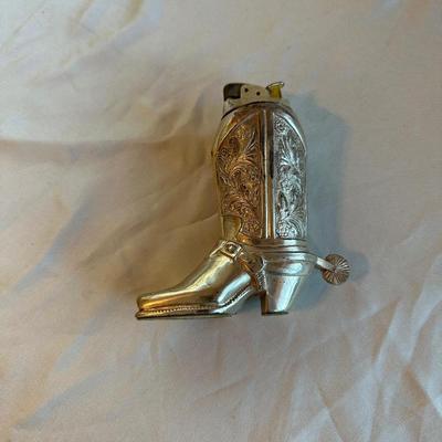 WESTERN BOOT TABLE LIGHTER, CIGARETTE CASE AND A MEASURING TAPE