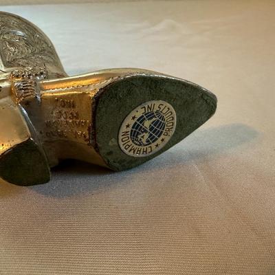 WESTERN BOOT TABLE LIGHTER, CIGARETTE CASE AND A MEASURING TAPE