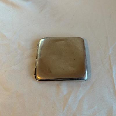 WESTERN BOOT TABLE LIGHTER, CIGARETTE CASE AND A MEASURING TAPE