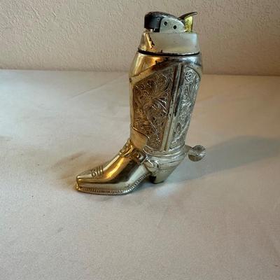 WESTERN BOOT TABLE LIGHTER, CIGARETTE CASE AND A MEASURING TAPE