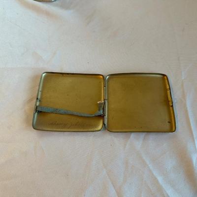 WESTERN BOOT TABLE LIGHTER, CIGARETTE CASE AND A MEASURING TAPE