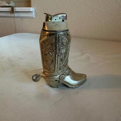 WESTERN BOOT TABLE LIGHTER, CIGARETTE CASE AND A MEASURING TAPE
