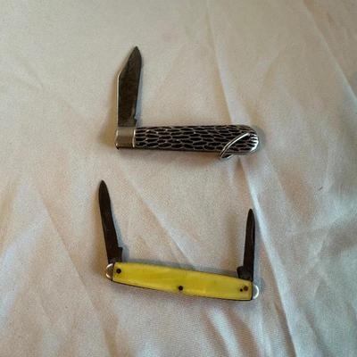 POCKET KNIVES, BUTANE LIGHTER AND A TAPE MEASURE