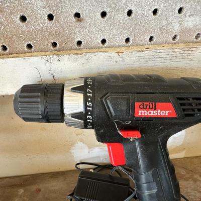 CORDLESS DRILL AND A VARIETY OF USEFUL ITEMS