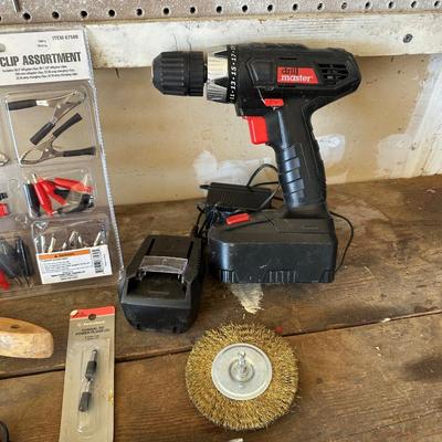 CORDLESS DRILL AND A VARIETY OF USEFUL ITEMS