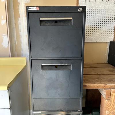 TWO 2 DRAWER METAL FILING CABINETS WITH HOME IMPROVEMENT BOOKS
