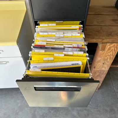 TWO 2 DRAWER METAL FILING CABINETS WITH HOME IMPROVEMENT BOOKS
