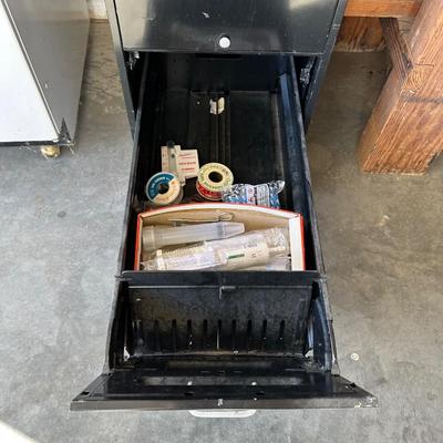 TWO 2 DRAWER METAL FILING CABINETS WITH HOME IMPROVEMENT BOOKS