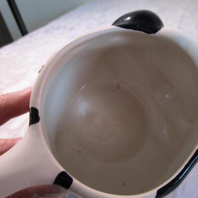 Ceramic cow mug