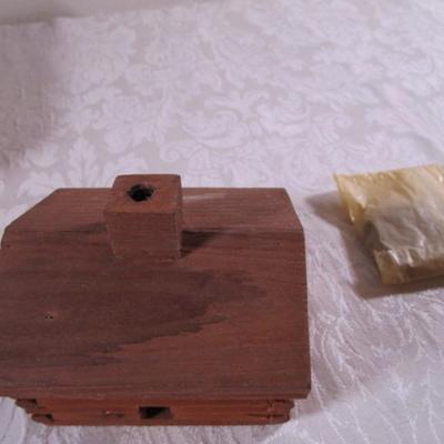 Small log house incense burner