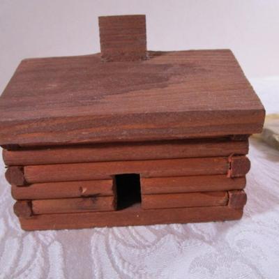 Small log house incense burner
