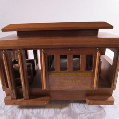 Wood musical cable car
