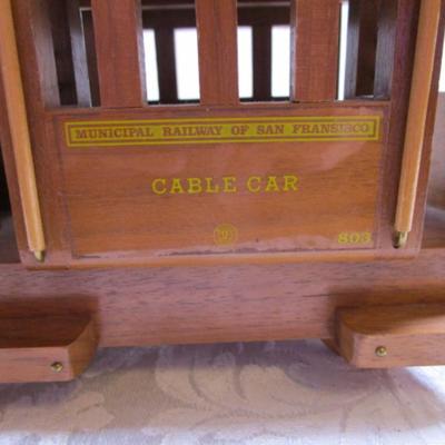 Wood musical cable car