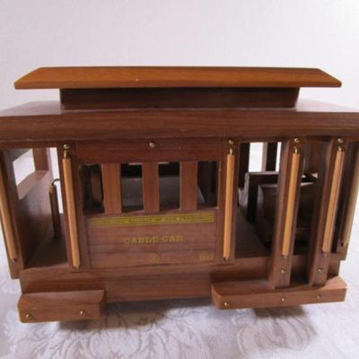 Wood musical cable car