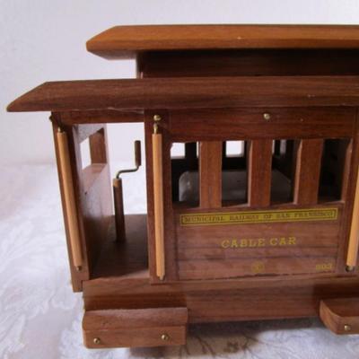 Wood musical cable car