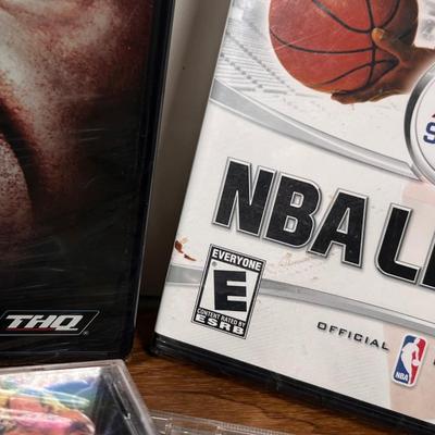 LOT 13B: PlayStation 2 WWF Smackdown vs. Raw Games, NBA Live 2006 & PS1 Games