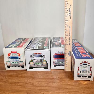 Lot 20B: Hess Trucks w/ Boxes - Rescue Truck, Fire Truck, Emergency Truck w/ Rescue Vehicle & Toy Truck and Race Car