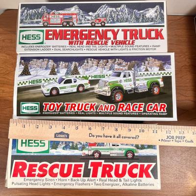 Lot 20B: Hess Trucks w/ Boxes - Rescue Truck, Fire Truck, Emergency Truck w/ Rescue Vehicle & Toy Truck and Race Car