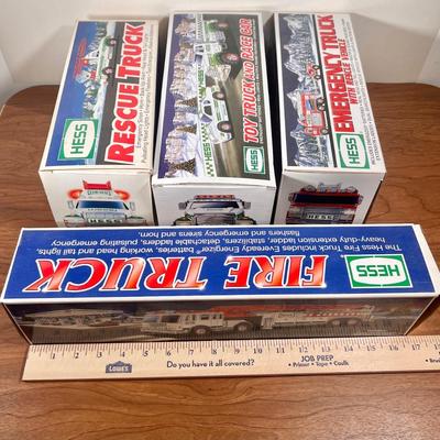 Lot 20B: Hess Trucks w/ Boxes - Rescue Truck, Fire Truck, Emergency Truck w/ Rescue Vehicle & Toy Truck and Race Car