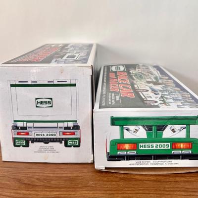 LOT 29B: Hess Trucks w/ Boxes - Toy Truck and Front Loader, Race Car and Racer & Toy Truck and Helicopter (2)