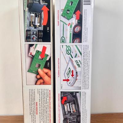 LOT 29B: Hess Trucks w/ Boxes - Toy Truck and Front Loader, Race Car and Racer & Toy Truck and Helicopter (2)