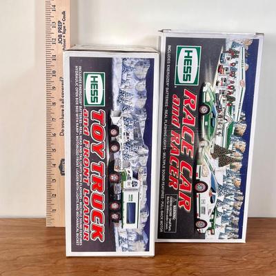 LOT 29B: Hess Trucks w/ Boxes - Toy Truck and Front Loader, Race Car and Racer & Toy Truck and Helicopter (2)
