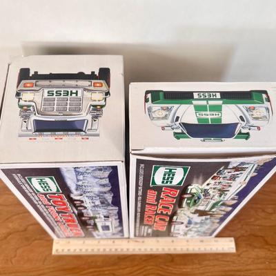 LOT 29B: Hess Trucks w/ Boxes - Toy Truck and Front Loader, Race Car and Racer & Toy Truck and Helicopter (2)
