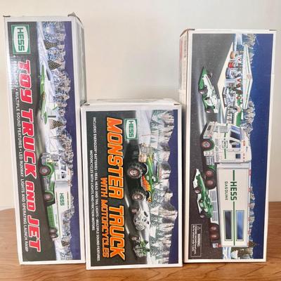 LOT 30B: Hess Trucks w/ Boxes - Monster Truck w/ Motorcycles, Toy Truck and Jet & Toy Truck and Racecars