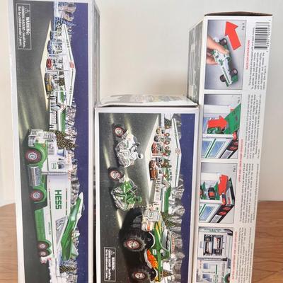 LOT 30B: Hess Trucks w/ Boxes - Monster Truck w/ Motorcycles, Toy Truck and Jet & Toy Truck and Racecars