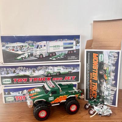 LOT 30B: Hess Trucks w/ Boxes - Monster Truck w/ Motorcycles, Toy Truck and Jet & Toy Truck and Racecars
