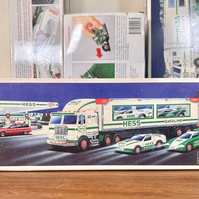 LOT 30B: Hess Trucks w/ Boxes - Monster Truck w/ Motorcycles, Toy Truck and Jet & Toy Truck and Racecars
