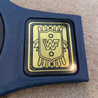 LOT 69 A: Children's Foam WCW & 1998 & 1999 Jakks WWF Replica Belts