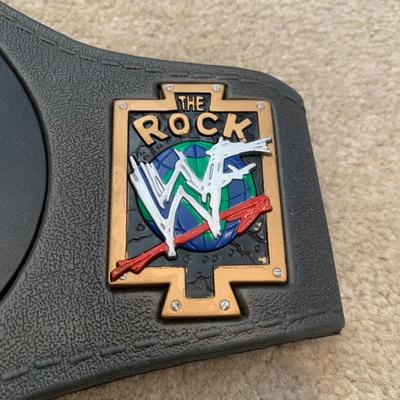 LOT 69 A: Children's Foam WCW & 1998 & 1999 Jakks WWF Replica Belts