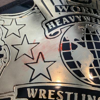 LOT 69 A: Children's Foam WCW & 1998 & 1999 Jakks WWF Replica Belts