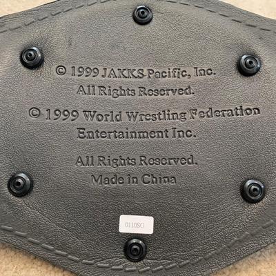 LOT 69 A: Children's Foam WCW & 1998 & 1999 Jakks WWF Replica Belts