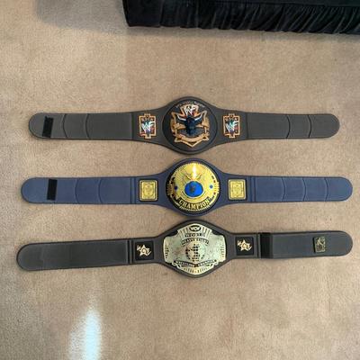 LOT 69 A: Children's Foam WCW & 1998 & 1999 Jakks WWF Replica Belts