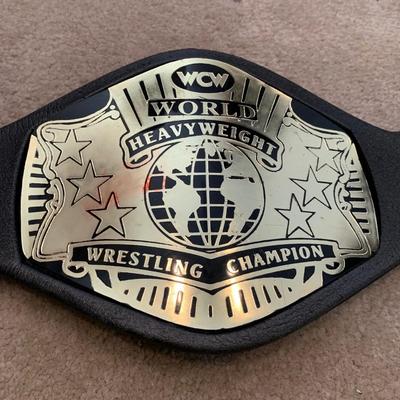 LOT 69 A: Children's Foam WCW & 1998 & 1999 Jakks WWF Replica Belts