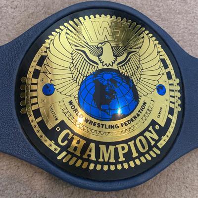 LOT 69 A: Children's Foam WCW & 1998 & 1999 Jakks WWF Replica Belts