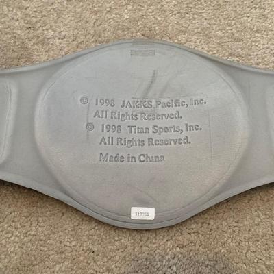 LOT 69 A: Children's Foam WCW & 1998 & 1999 Jakks WWF Replica Belts